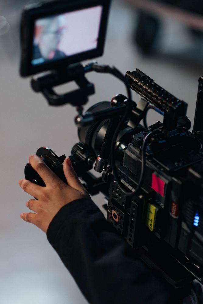 Camera operator filming a music video